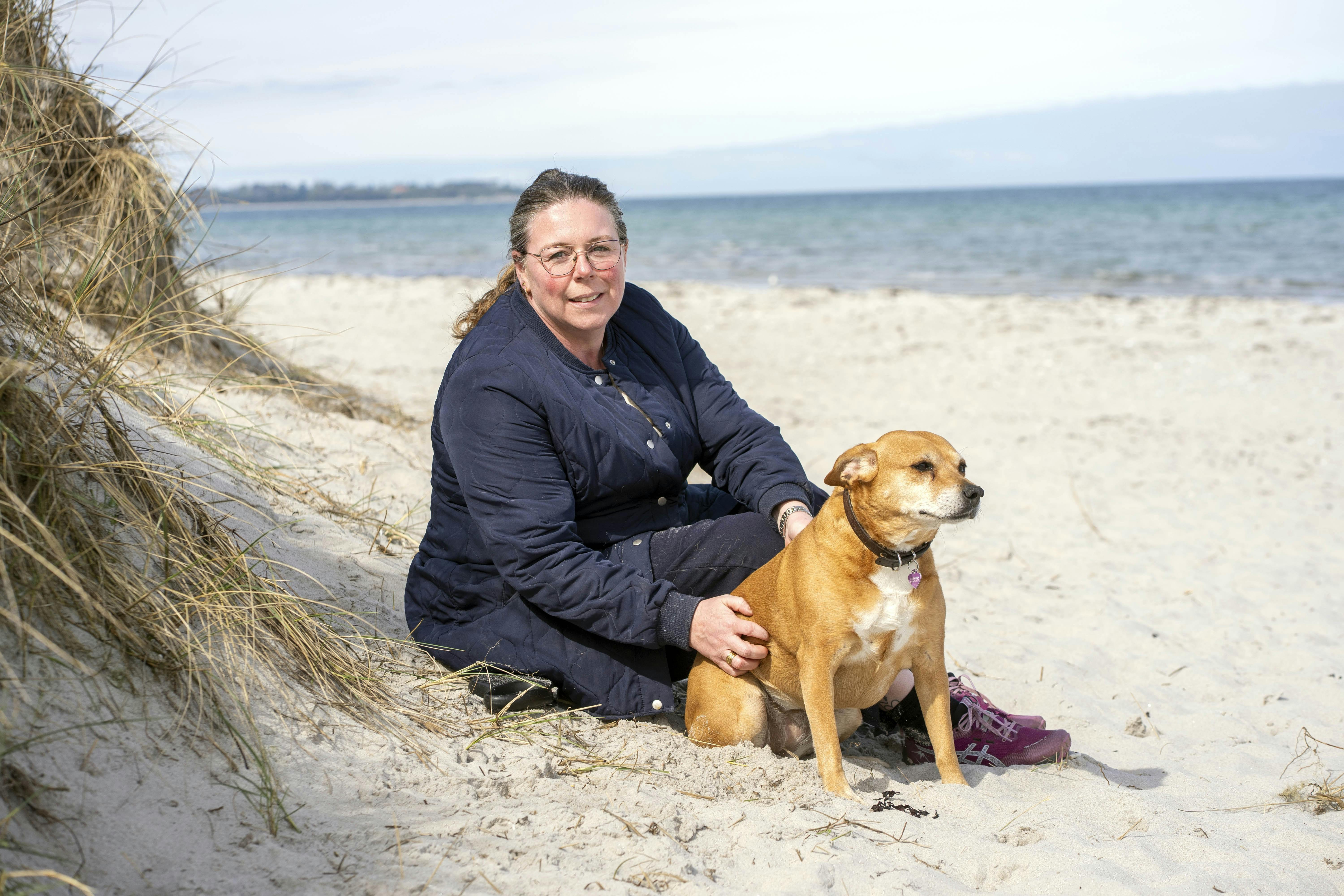 Christina med sin hund.