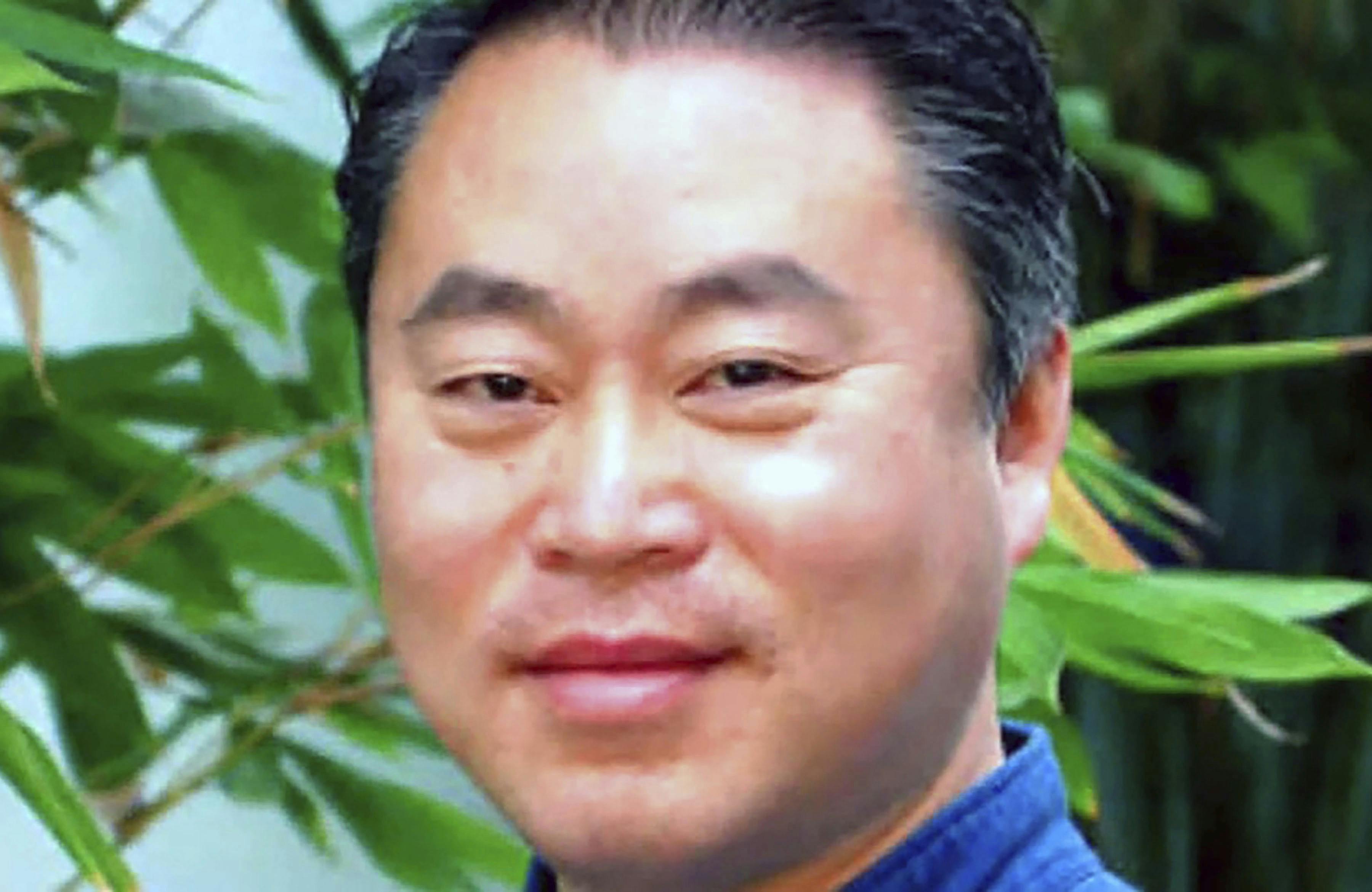 Henry Han blev dræbt i sit sammen sammen med sin kone og datter.